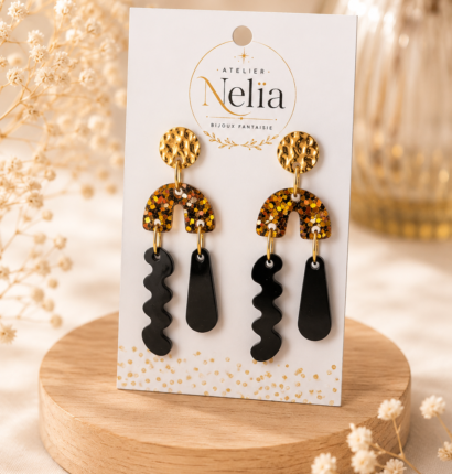 Boucles d'oreilles noires et dorées