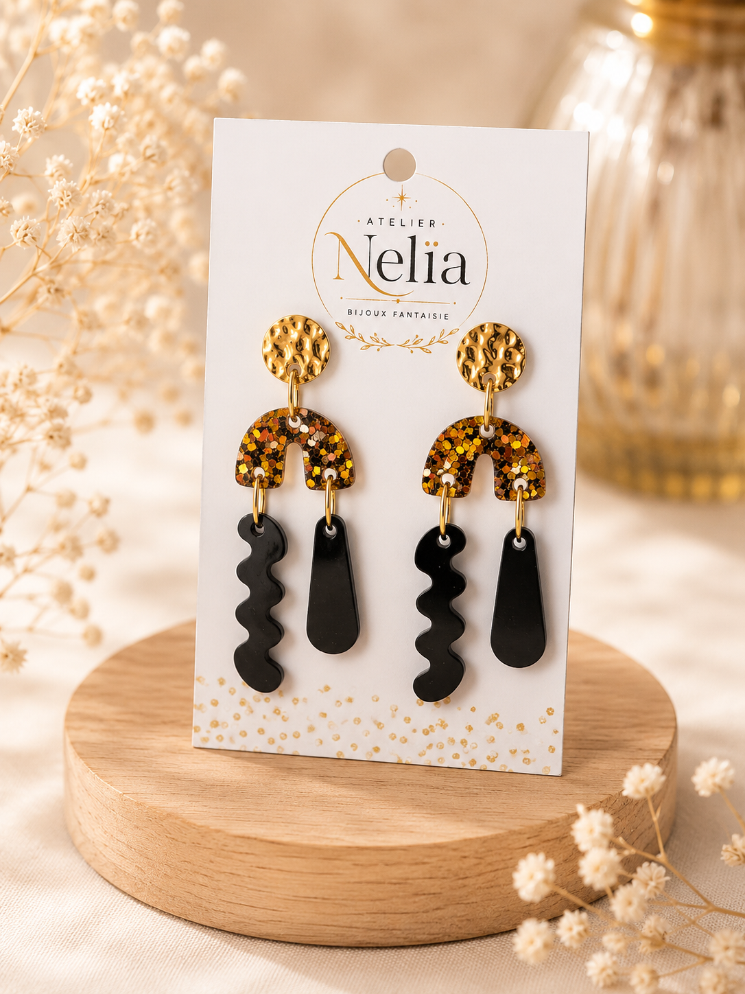 Boucles d'oreilles noires et dorées